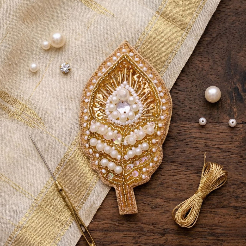 White And Gold Peacock Tail Pin