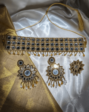 Swarna Rag - Neckpiece, Earrings and Ring