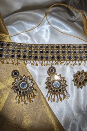 Swarna Rag - Neckpiece, Earrings and Ring